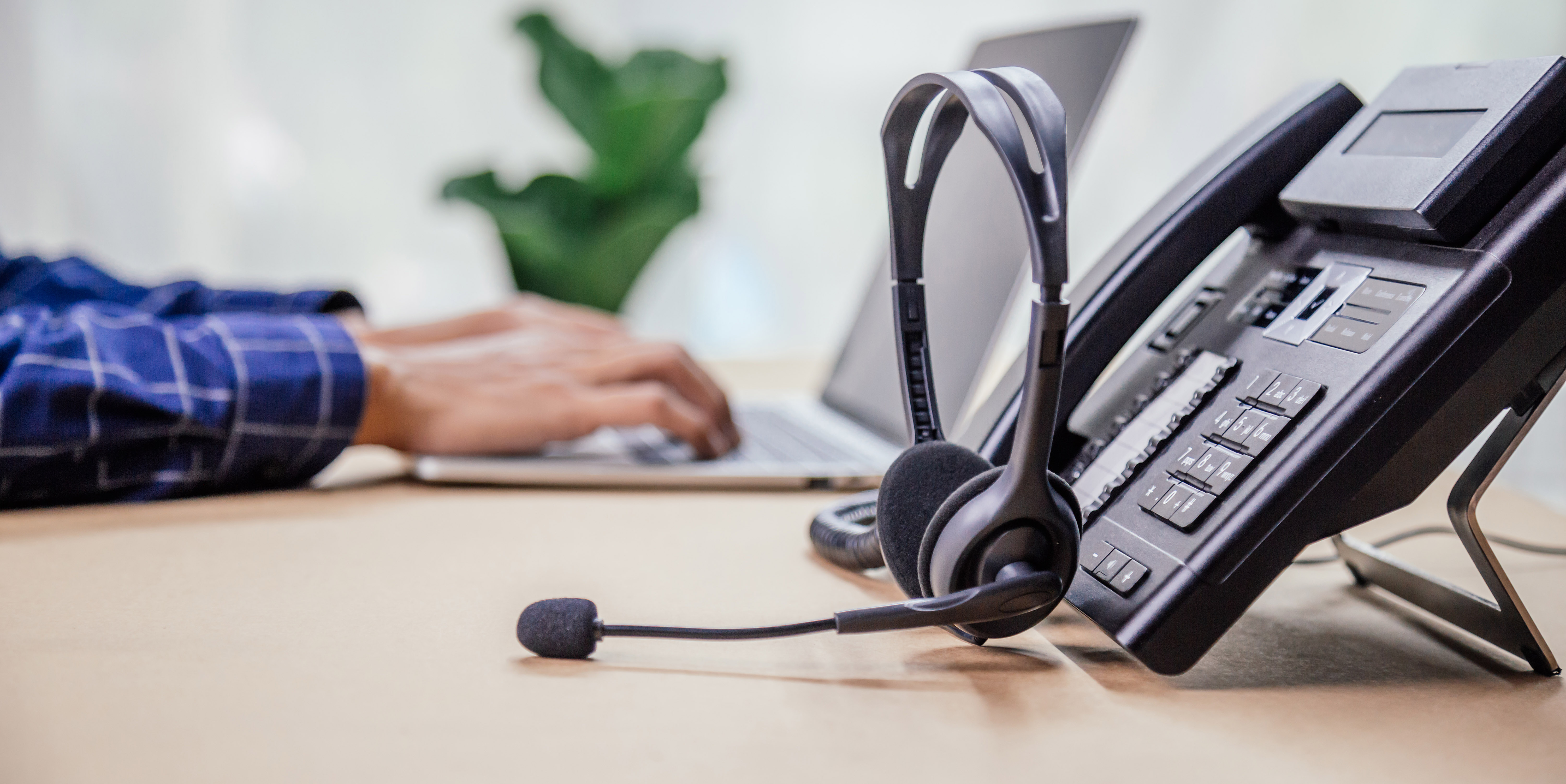 Callers Headset And Hard Desk Phone