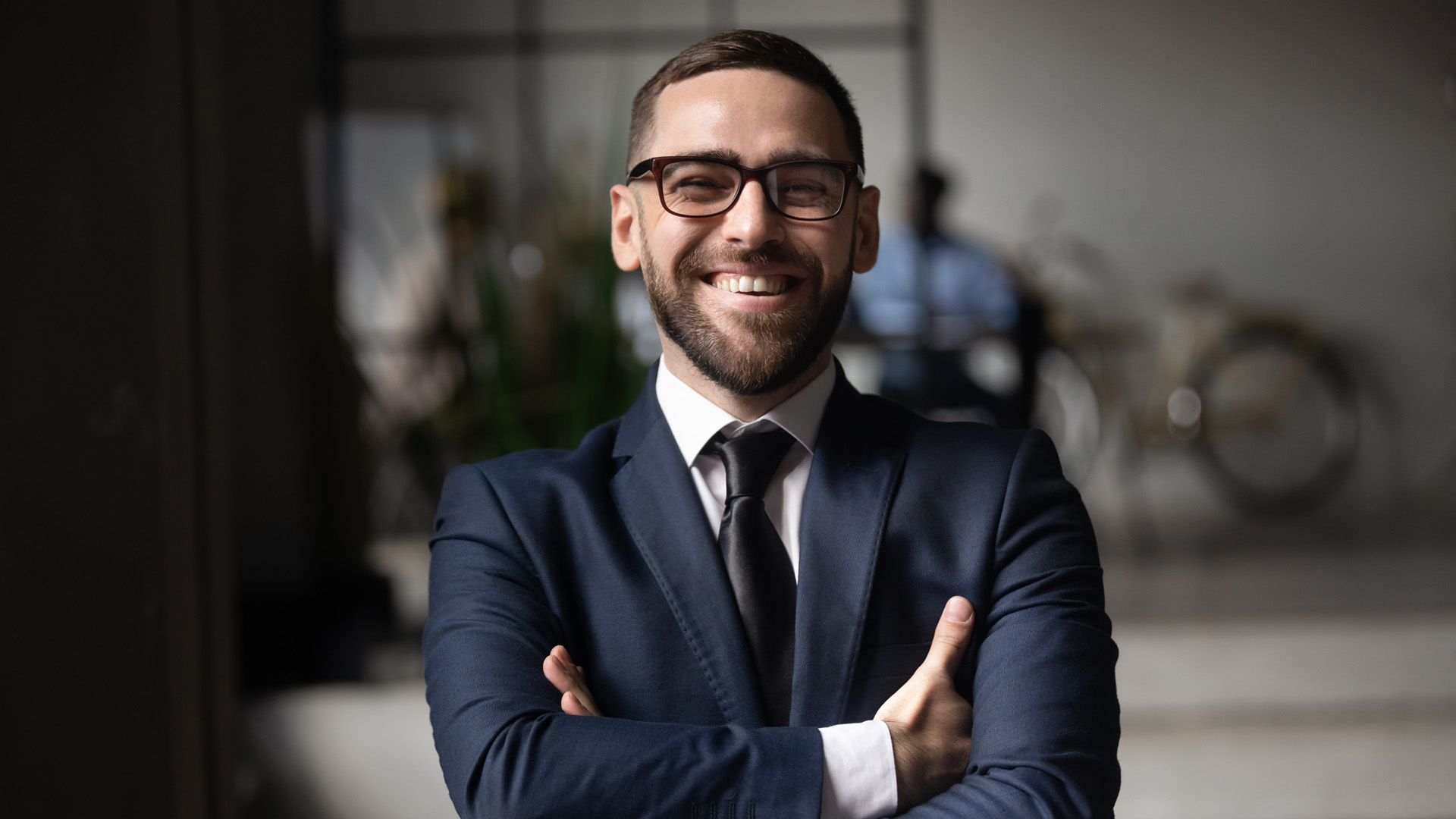 Professional young male smiling at camera