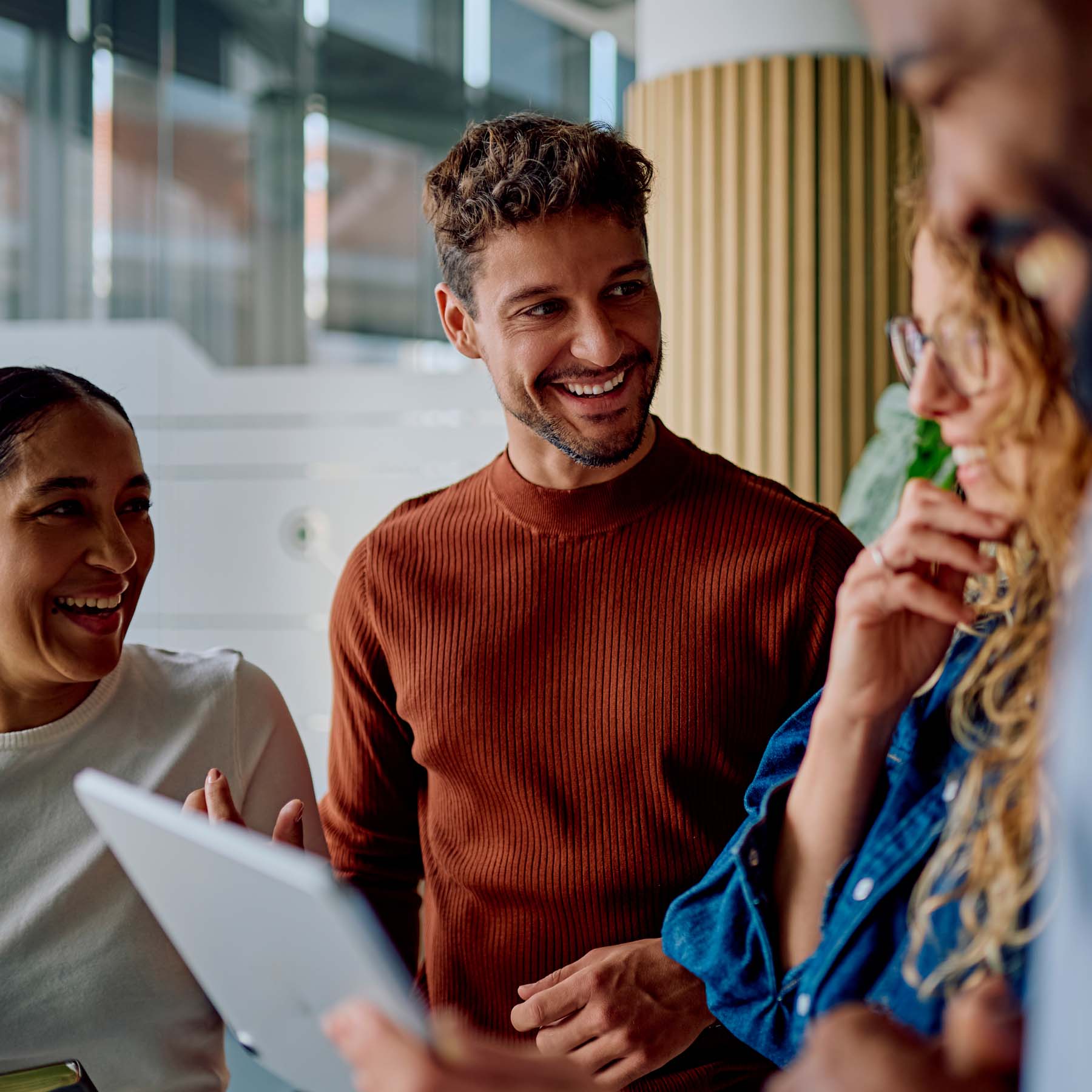 Male and Female Colleagues laughing together