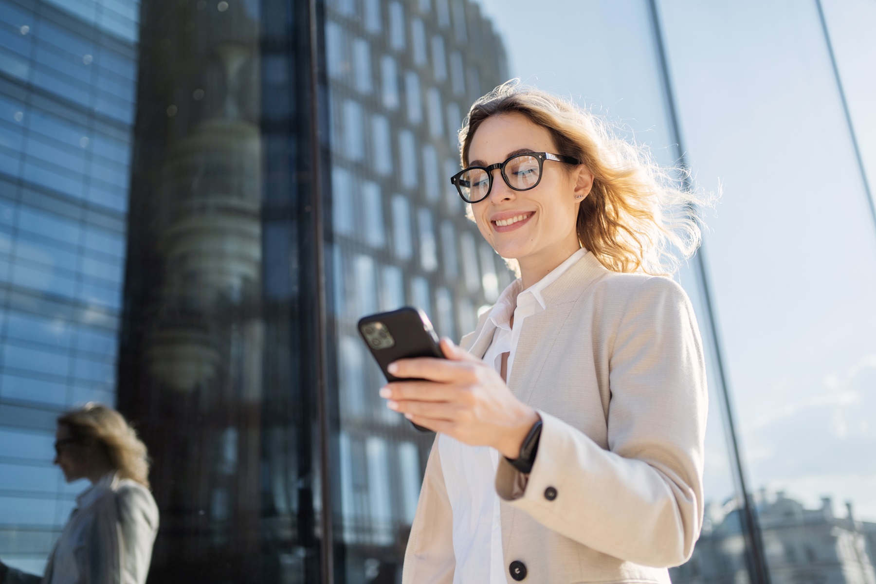 Woman Smiling At Phone