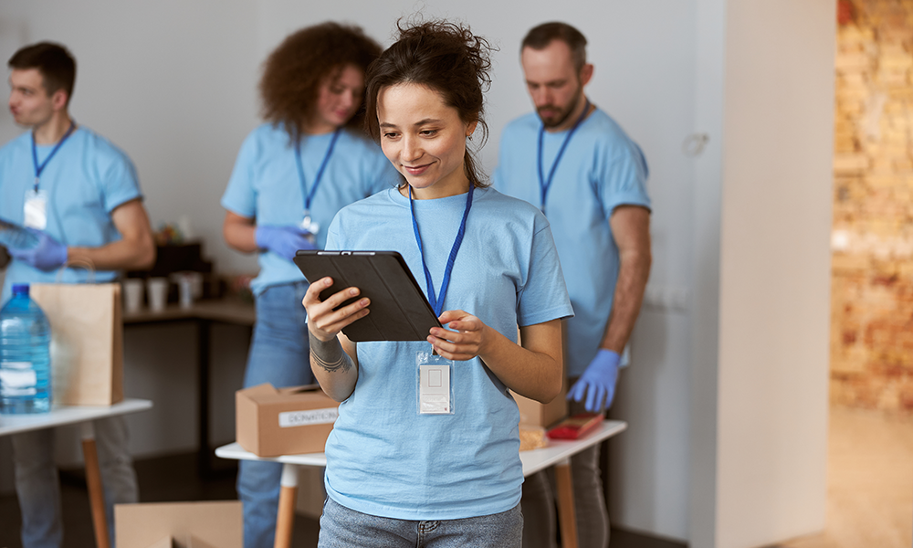 Charity Workers On Laptop