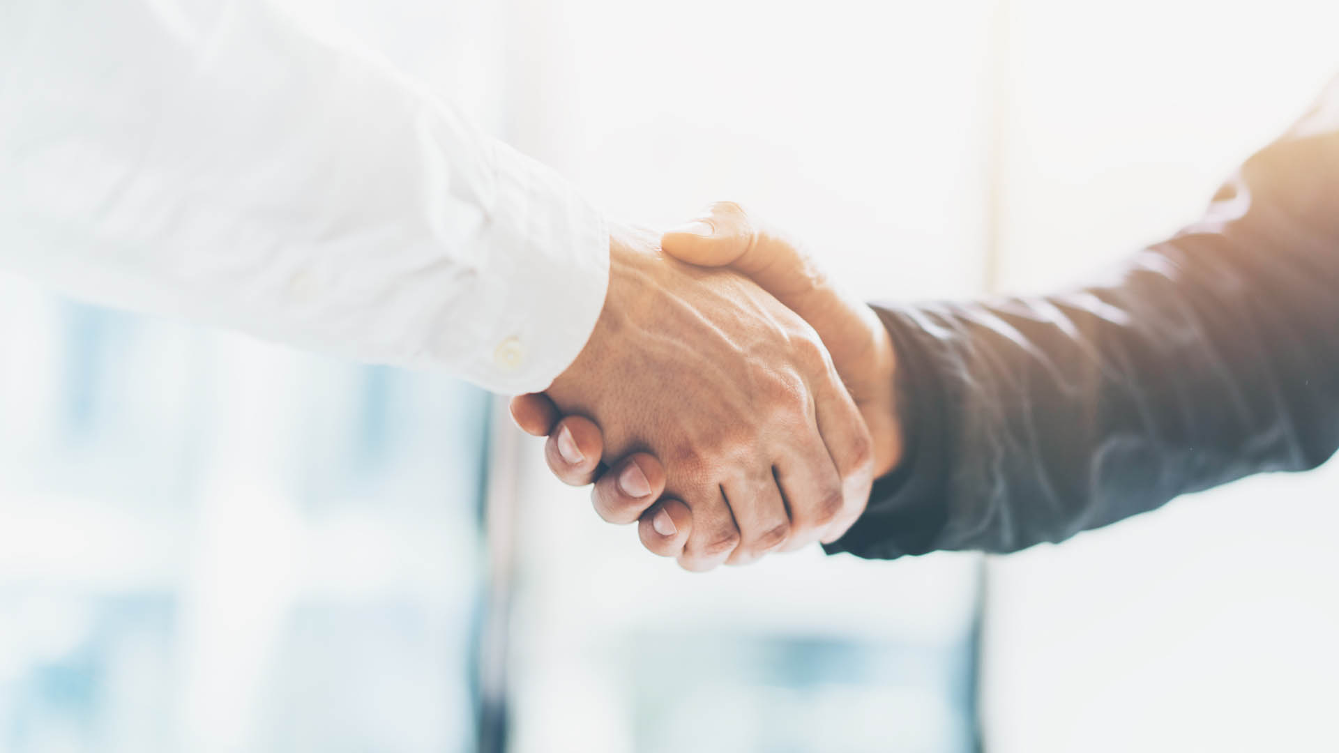 Britannic and Five9 abstract partnership handshake