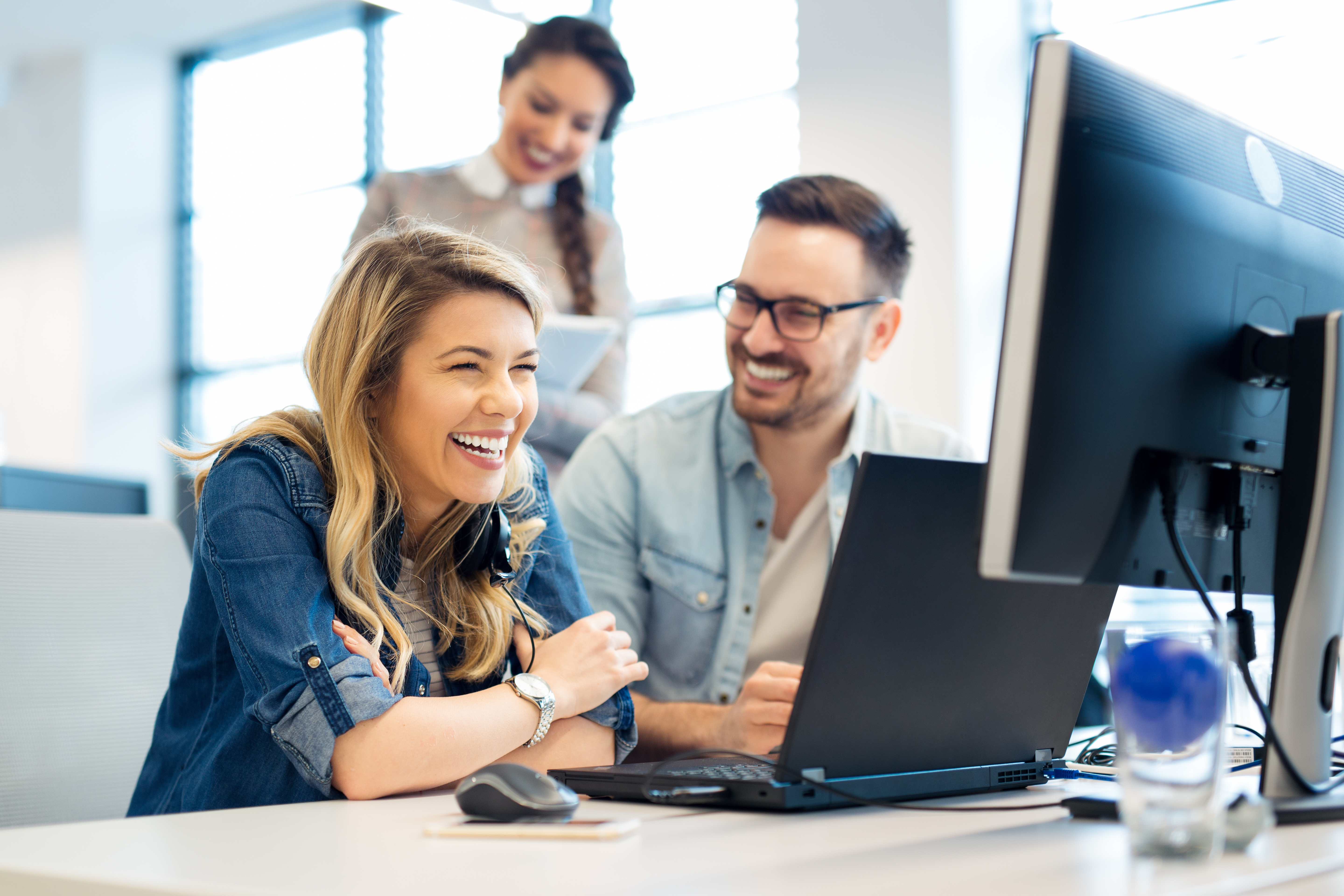 Happy Workers On A Meeting